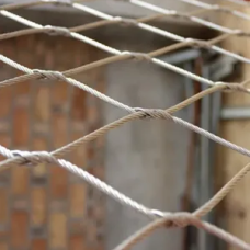 Сетка нержавеющая тросовая с параллельным узловым креплением и ромбической ячейкой Н2 7х7 AISI 316 25х43х1 мм